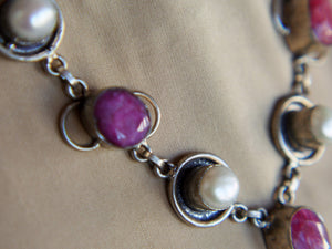 Collana in argento con radice di rubino e madreperla.  lunghezza 50cm, peso 39grammi