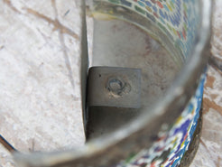 Dettaglio del punto di aggangio dell'applique