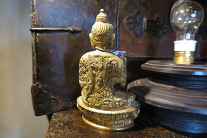 statua in metallo raffigurante buddhe della medicina .   1620 gr  12 x 9 h.20 