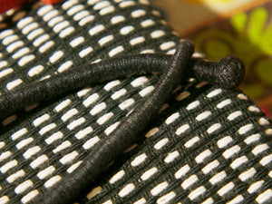 collane in cotone intrecciato con pendaglio  moneta antica afgana con scrittura araba .  pezzi unici con pendaglio riciclato .  ulteriori info e foto contattare .