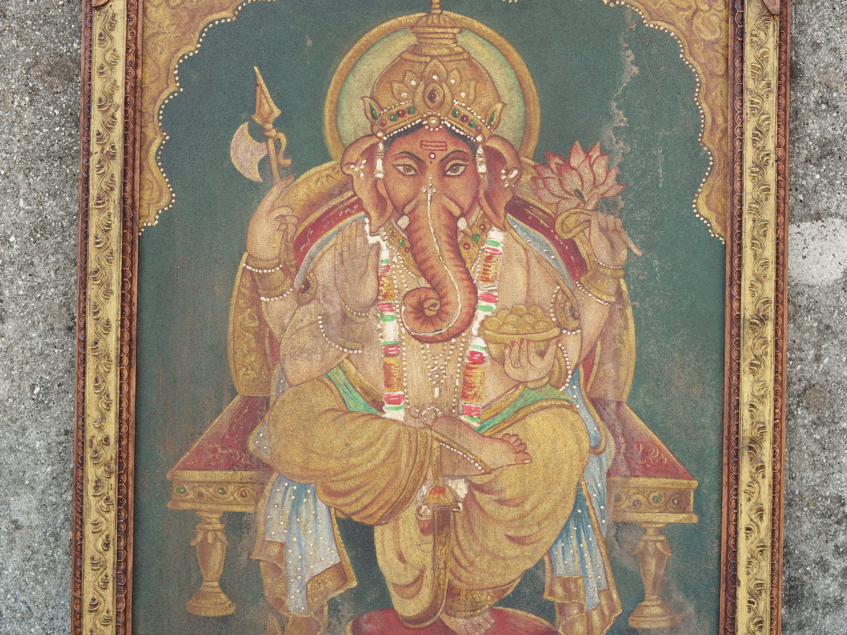 Primo piano del volto e dei dettagli iconografici del quadro.