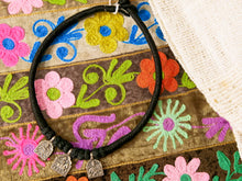 Carica l&#39;immagine nel visualizzatore di Gallery, collana in cotone intrecciato con tris di vecchi  pendagli in argento databili primi 900 raffigurante tipiche figure tribali dell&#39;india del nord .  misure collana 42 pendaglio 2 x 2 cm peso 21 gr 