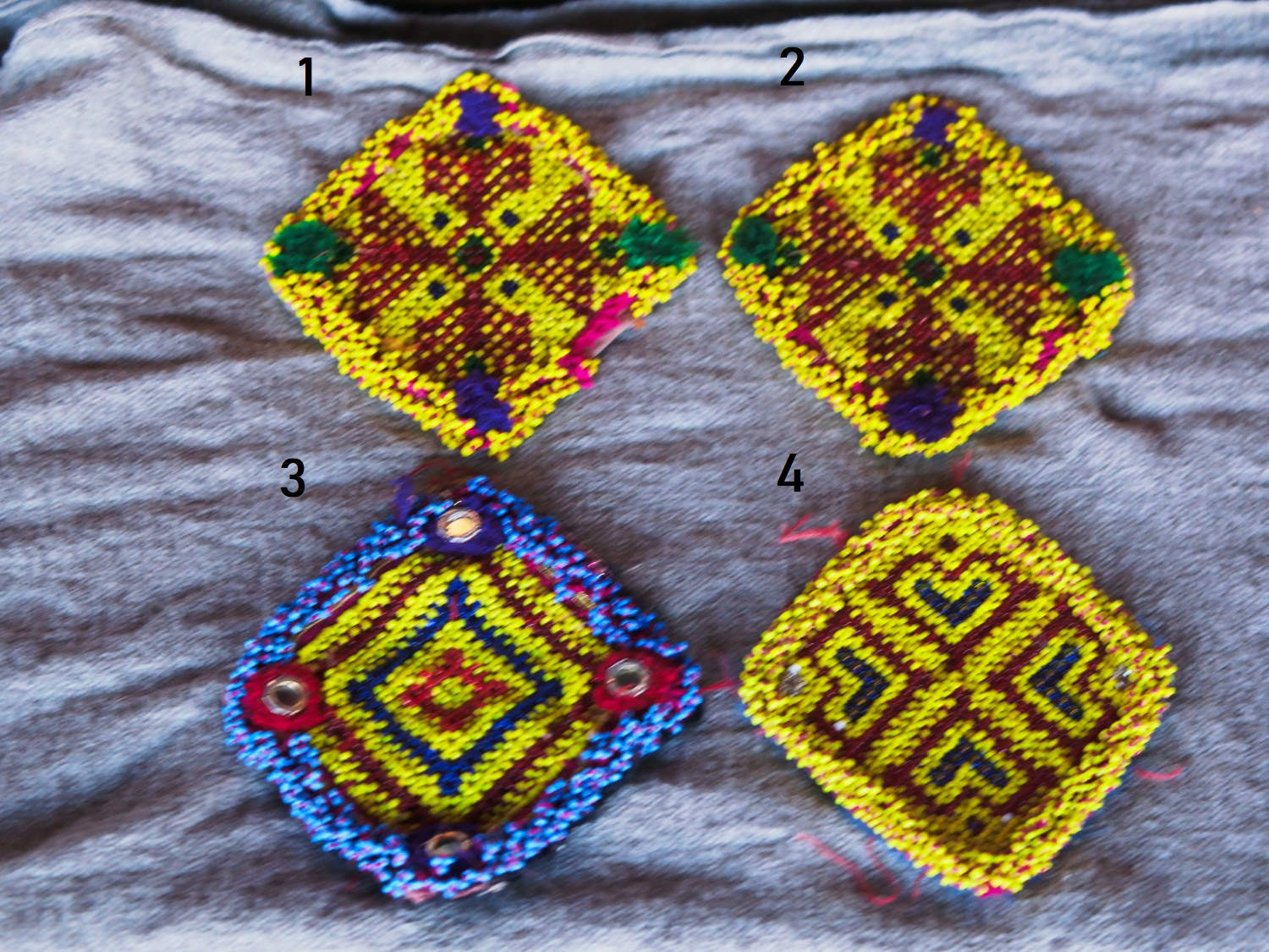 vecchio tessuto indiano ricamato , pezzo unico lavorato a mano in ogni parte con filo in cotone , filo oro e perline . tipico del gujarat usato come decoro ed addobbo .  misure 15 x 13 x 1  cm indicative ( + / - 1 cm)  peso 40/45 gr   indicare sull'ordine il numero scelto   disponibili vari colori e dimensioni  contattare per info  0039 3338778241 info@etniko.it  fb/ig etniko by crosato