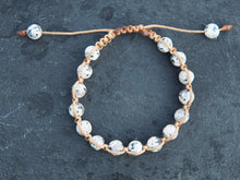 Carica l&#39;immagine nel visualizzatore di Gallery, Bracciale intrecciato con lapislazzulo. Pezzo unico assemblato artigianalmente. alcune caratteristiche del lapislazzulo... stimollunghezza regolabile 16/24cm, altezza 1cm, peso 15 grammi
