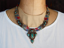 Carica l&#39;immagine nel visualizzatore di Gallery, collana nepalese / tibetana multifilo con corallo, turchese, lapis e argento. no pasta ma pietre vere non tinte o modificate nel colore, qualità top. assemblata artigianalmente, pezzo unico.  lunghezza totale collana 43 cm, pendaglio 3.5x5.5cm, peso 74 gr
