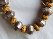 Carica l&#39;immagine nel visualizzatore di Gallery, collana indiana in cotone intrecciato ed elementi &quot;olive&quot; in cera con lamina di argento .   lunghezza totale 120 cm, misura regolabile misura singolo elemento in argento 1.5 x 1 cm,  peso 120 gr    per ulteriori info o foto watshapp 3338778241 mail info@etniko.it fb, ig, etsy &quot;etnikobycrosato&quot;