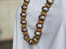 Carica l&#39;immagine nel visualizzatore di Gallery, collana indiana in cotone intrecciato ed elementi &quot;olive&quot; in cera con lamina di argento .   lunghezza totale 120 cm, misura regolabile misura singolo elemento in argento 1.5 x 1 cm,  peso 120 gr    per ulteriori info o foto watshapp 3338778241 mail info@etniko.it fb, ig, etsy &quot;etnikobycrosato&quot;