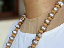 Carica l&#39;immagine nel visualizzatore di Gallery, collana indiana in cotone intrecciato ed elementi &quot;olive&quot; in cera con lamina di argento .   lunghezza totale 120 cm, misura regolabile misura singolo elemento in argento 1.5 x 1 cm,  peso 120 gr    per ulteriori info o foto watshapp 3338778241 mail info@etniko.it fb, ig, etsy &quot;etnikobycrosato&quot;