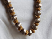 Carica l&#39;immagine nel visualizzatore di Gallery, collana indiana in cotone intrecciato ed elementi &quot;olive&quot; in cera con lamina di argento .   lunghezza totale 120 cm, misura regolabile misura singolo elemento in argento 1.5 x 1 cm,  peso 120 gr    per ulteriori info o foto watshapp 3338778241 mail info@etniko.it fb, ig, etsy &quot;etnikobycrosato&quot;