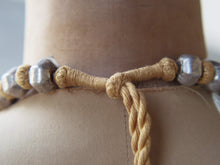 Carica l&#39;immagine nel visualizzatore di Gallery, collana indiana in cotone intrecciato ed elementi &quot;olive&quot; in cera con lamina di argento .   lunghezza totale 120 cm, misura regolabile misura singolo elemento in argento 1.5 x 1 cm,  peso 120 gr    per ulteriori info o foto watshapp 3338778241 mail info@etniko.it fb, ig, etsy &quot;etnikobycrosato&quot;