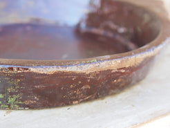 piatto in legno con 2 manici ricavato da un unico tronco di legno.  dimensioni 53x41 h7cm.